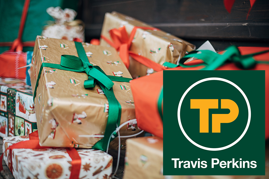 Wrapped Christmas presents and the Travis Perkins logo