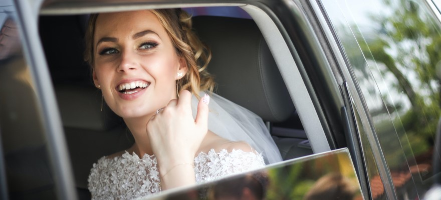 Bride lookig out of car window