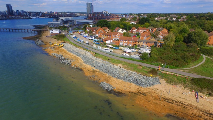 Aerial photo capturing the construction of the coastal works