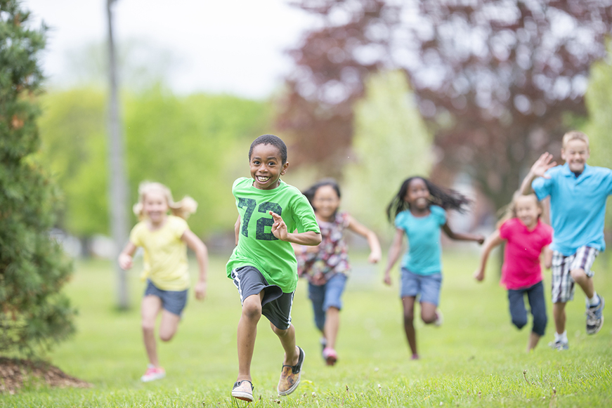 Kids Running In A Park