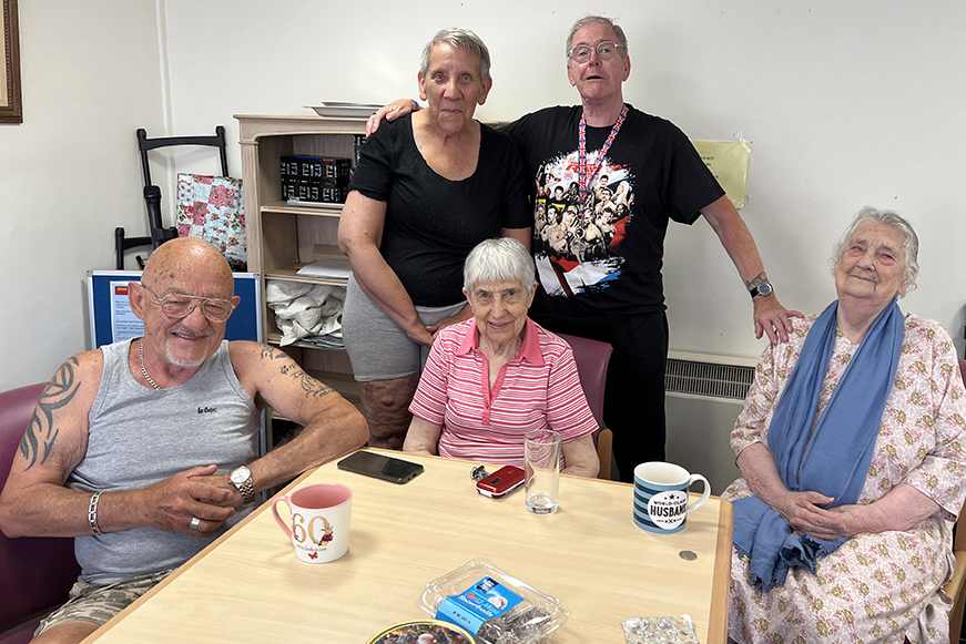 James Street residents posing for a photograph at a coffee morning