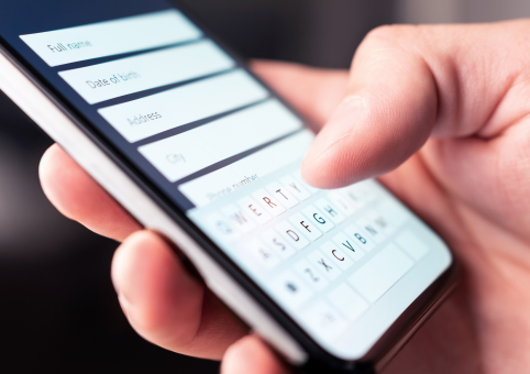 Someone filling out a form on a mobile