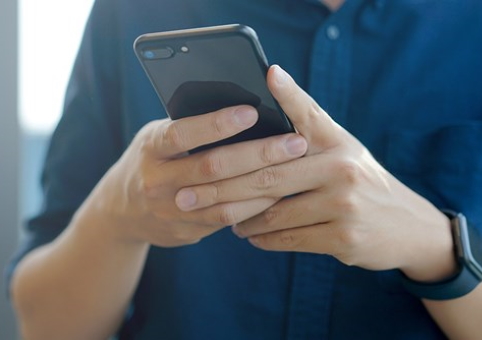 Someone holding a phone