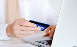 Woman holding credit card