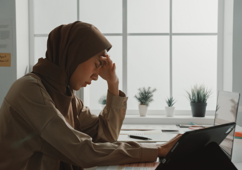 Woman looking depressed at work