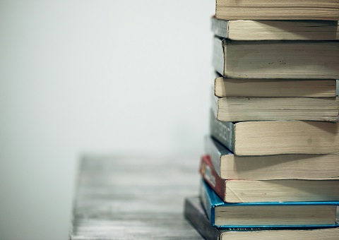 A stack of books on a table