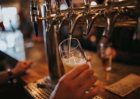 A pint being pulled at a pub