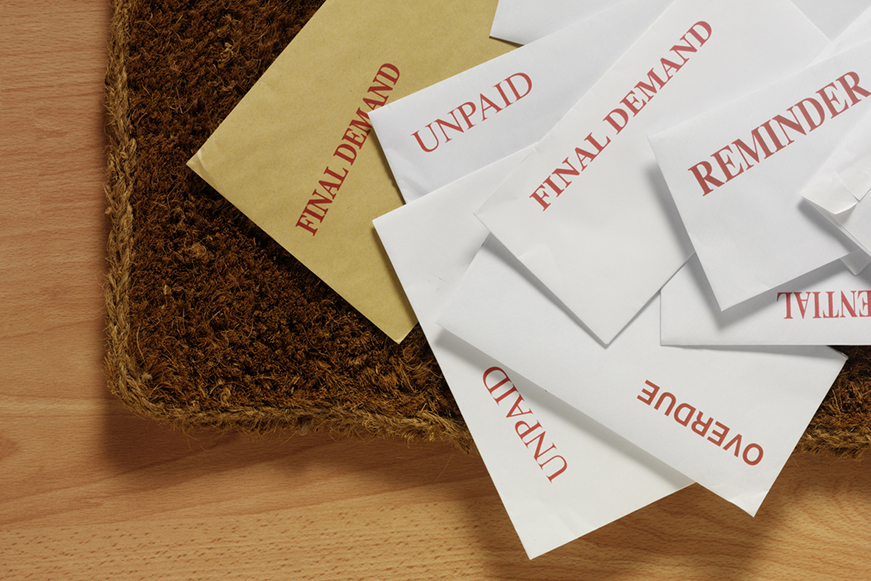 Letters on a door mat, variously saying "Final Demand", "Unpaid", "Reminder" and "Overdue" Letters on a door mat, variously saying "Final Demand", "Unpaid", "Reminder" and "Overdue"