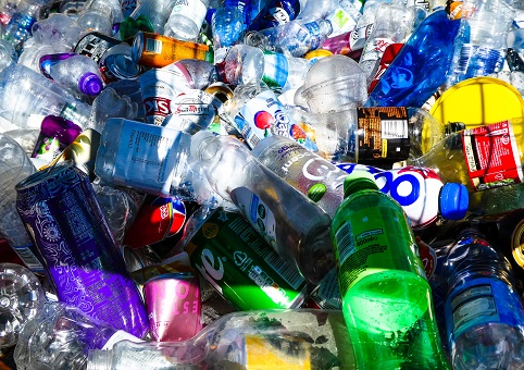 Plastic bottles and drink cans in a pile