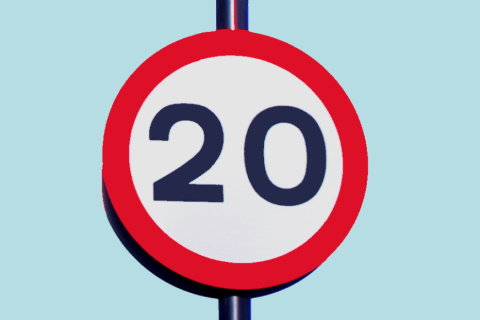 A sign indicating a 20 mile per hour speed limit