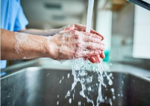 Someone washing hands