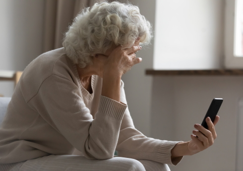 Woman waiting by her phone