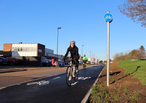 Person cycling on a cycle path