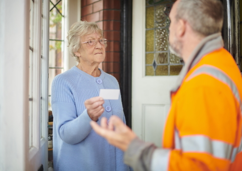 Woman looking at caller's ID