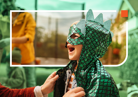Child in a dinosaur costume