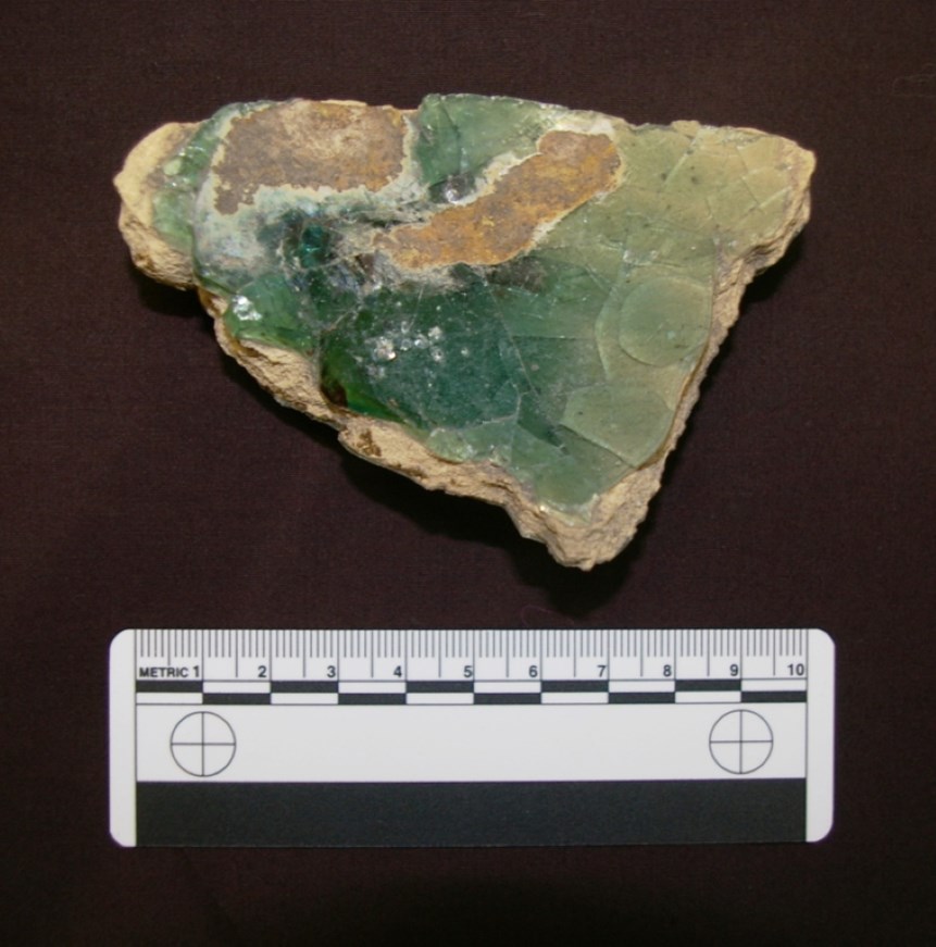 A sherd with glassy deposit