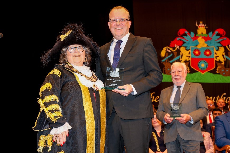 Paul Woodman receiving his award from Lord Mayor Rayment