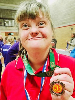 Photo of Emma with her medal