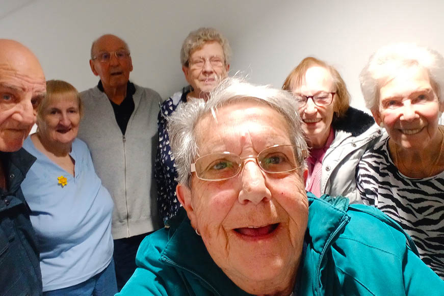 A group photo of attendees at the tenant association celebration