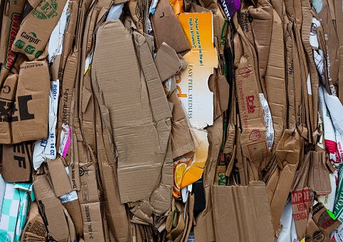 Cardboard boxes flattened tightly together