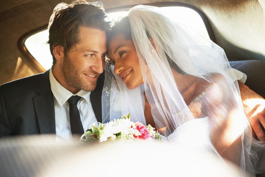Just married couple in wedding car