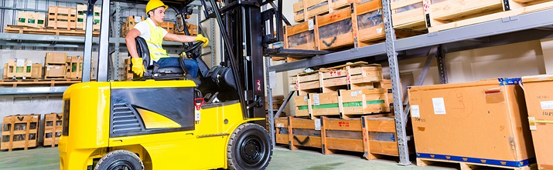 Fork lift truck working in a factory