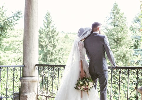 Wedding couple surrounded by trees