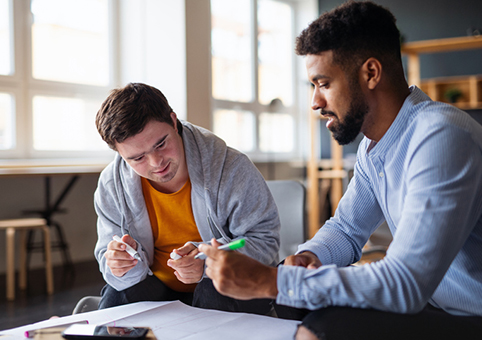 Teacher discussing with student