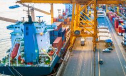 A container ship beside a dock