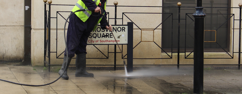 Jet washing pavement