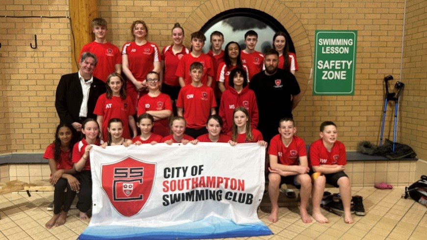 Cabinet Member for a Safer City, Cllr Matt Renyard with members of City of Southampton Swimming Club. Photo taken at The Quays Swimming & Diving Complex