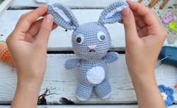 Person holding toy rabbit