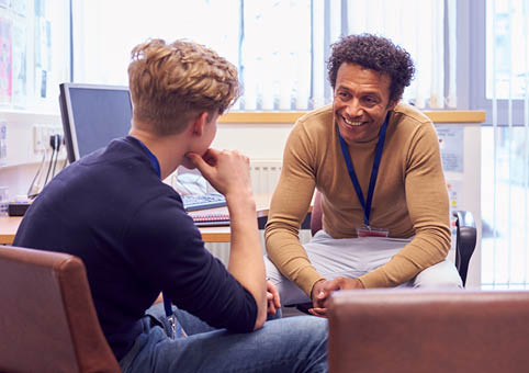 Young person talking to an advisor