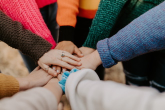 Children holding hands in the centre