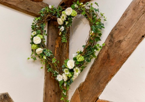 Flower wreath in shape of a heart