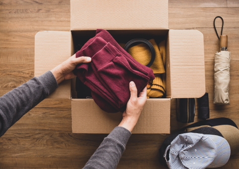 Box being packed with personal belongings