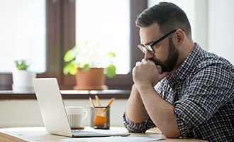 Person looking at laptop