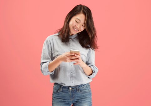 Young woman looking at phone