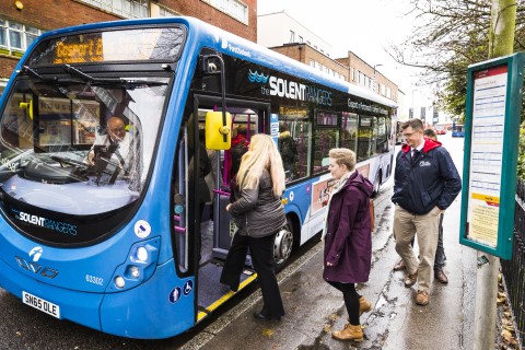 Queueing to board a bus