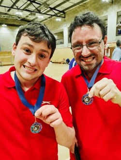 Photo of Owen and Matthew with their medals