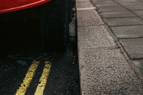 A car parked on double-yellow lines