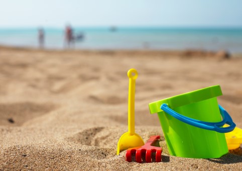 Beach with bucket and spade