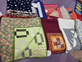Quilts donated by the Quilts for Care Leavers project