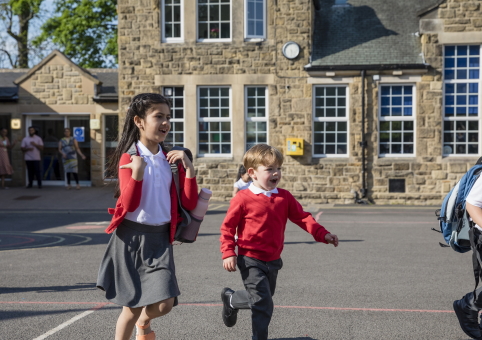 Children running in playground