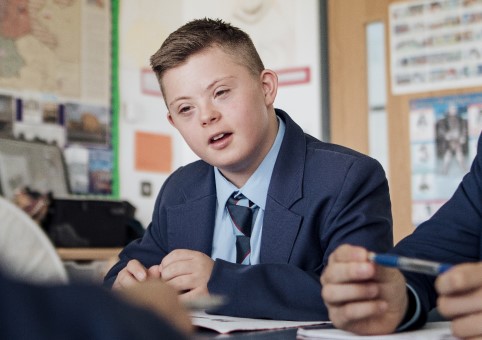 Young person with Down's syndrome at school