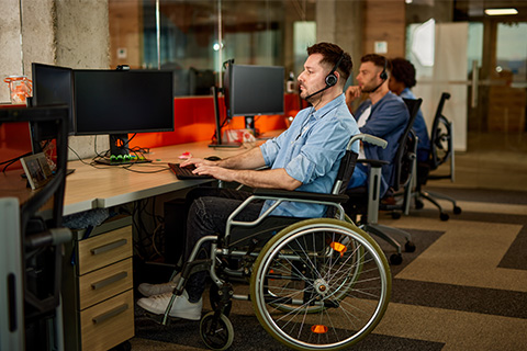 A person in a wheelchair working