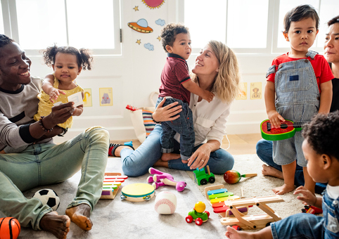 Parents and children playing