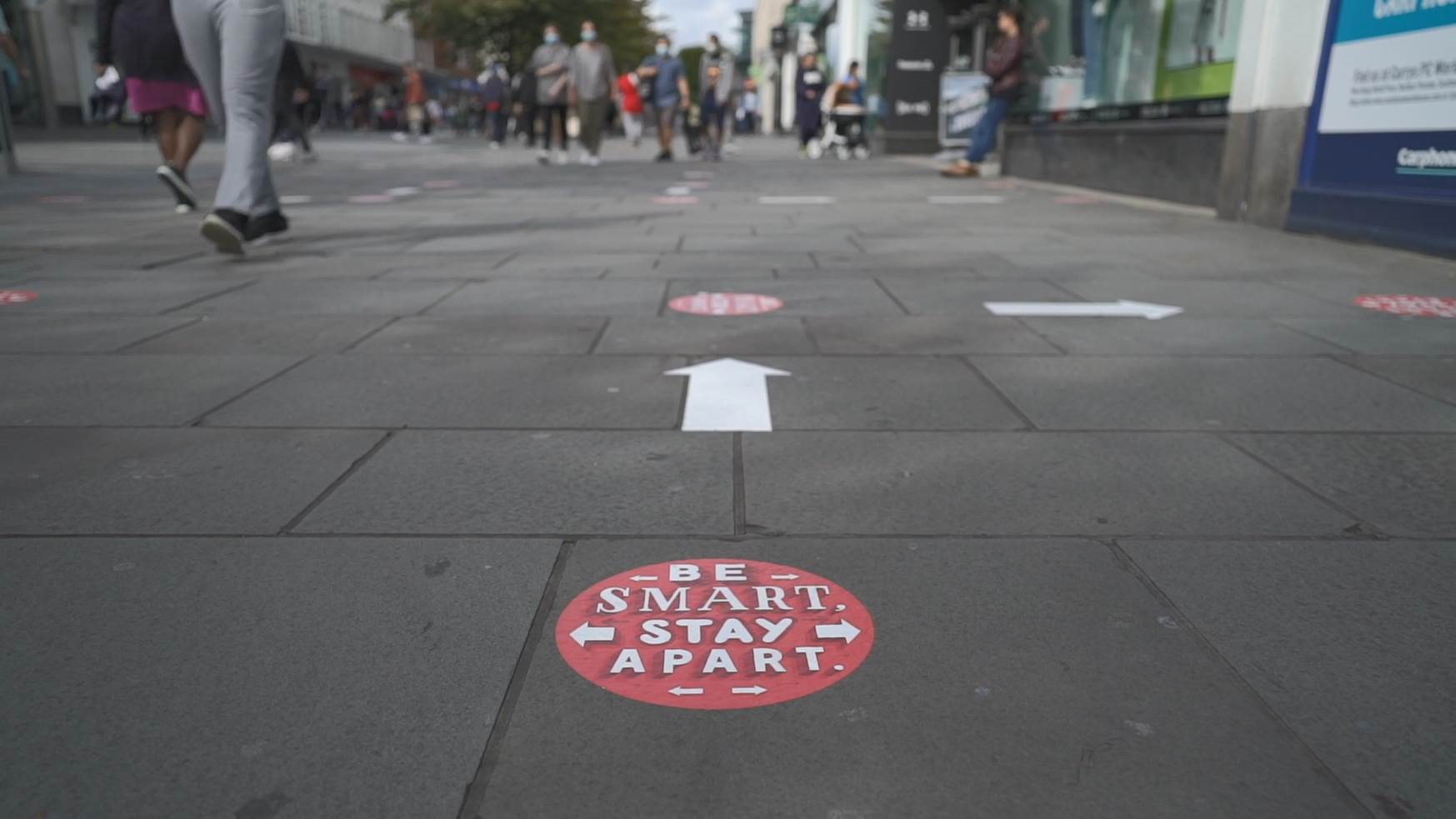 Sticker on the ground at Above Bar Street saying 'Be smart, stay apart' to guide social distancing while queuing at shops.