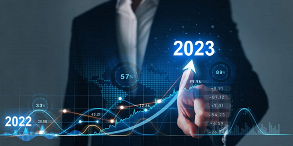 Person Pointing To 2023 Forecast