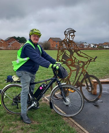 David Howells with the sculpture of him